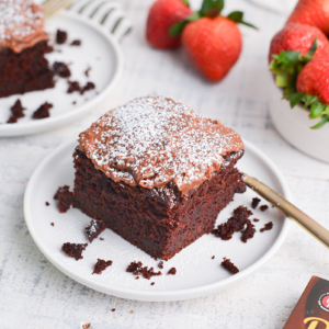 angled shot of slice of beet chocolate cake on plate