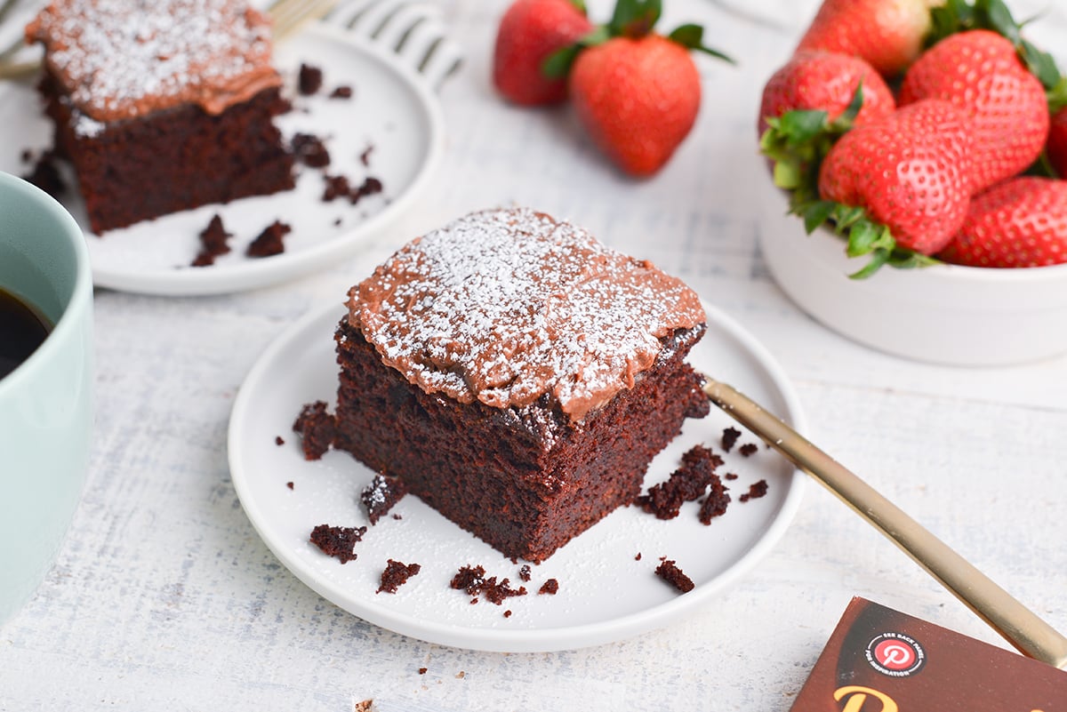 angled shot of slice of beet chocolate cake on plate