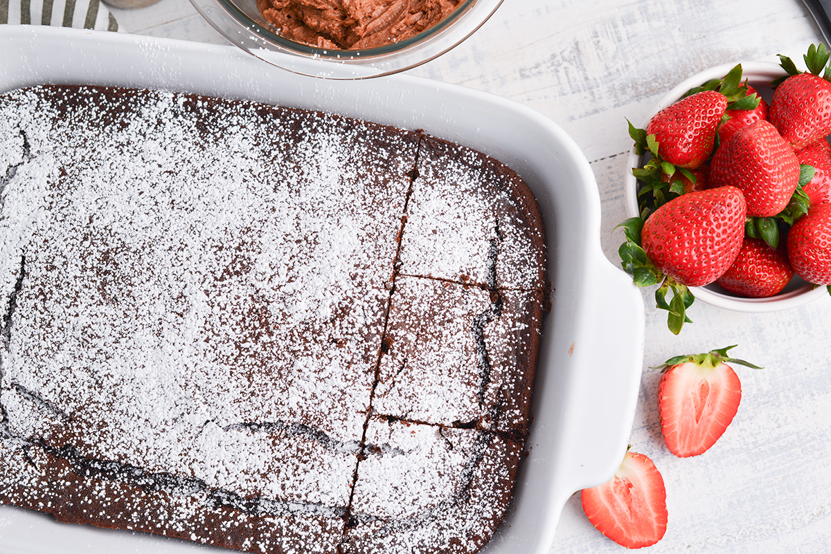 overhead shot of chocolate beet cake sliced in pan