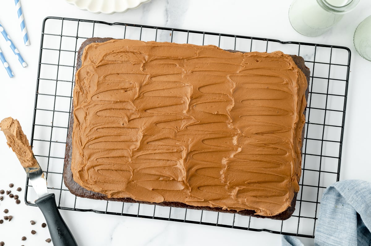 overhead shot of frosted mayo cake recipe on cooling rack