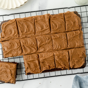 overhead shot of sliced chocolate mayonnaise cake on cooling rack