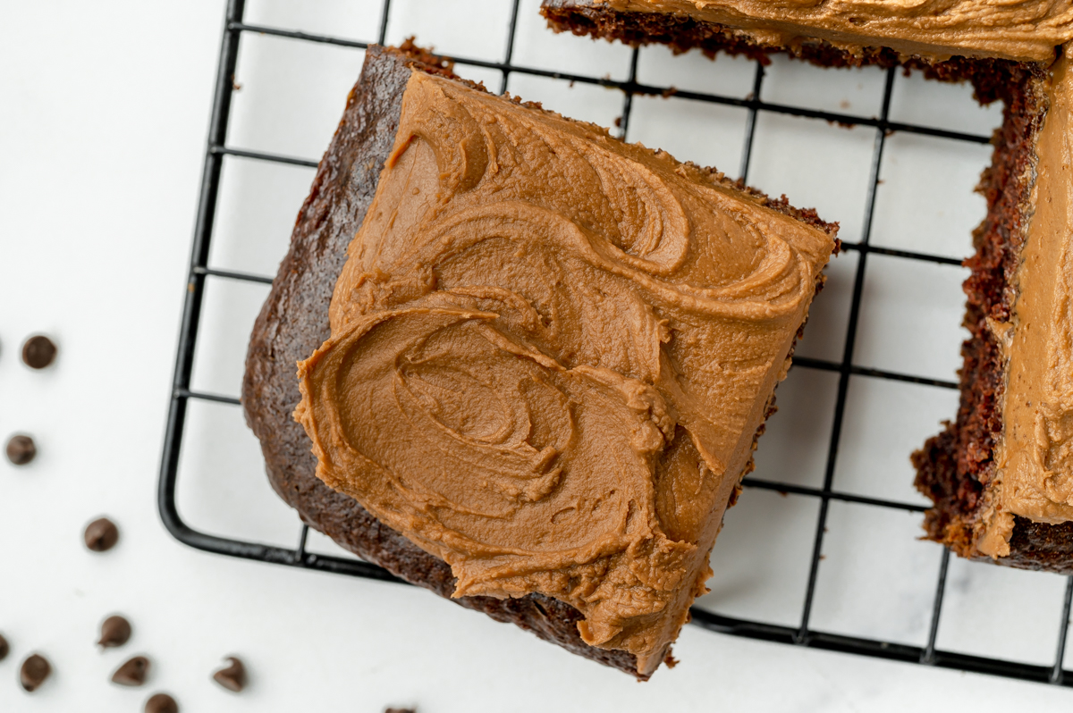 overhead shot of slice of easy chocolate cake on cooling rack