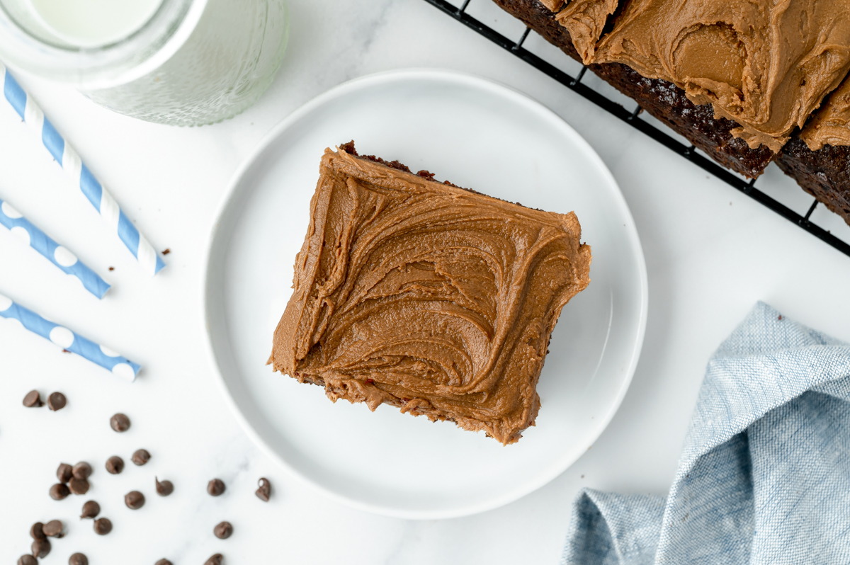 overhead shot of slice of chocolate and mayonnaise cake on plate