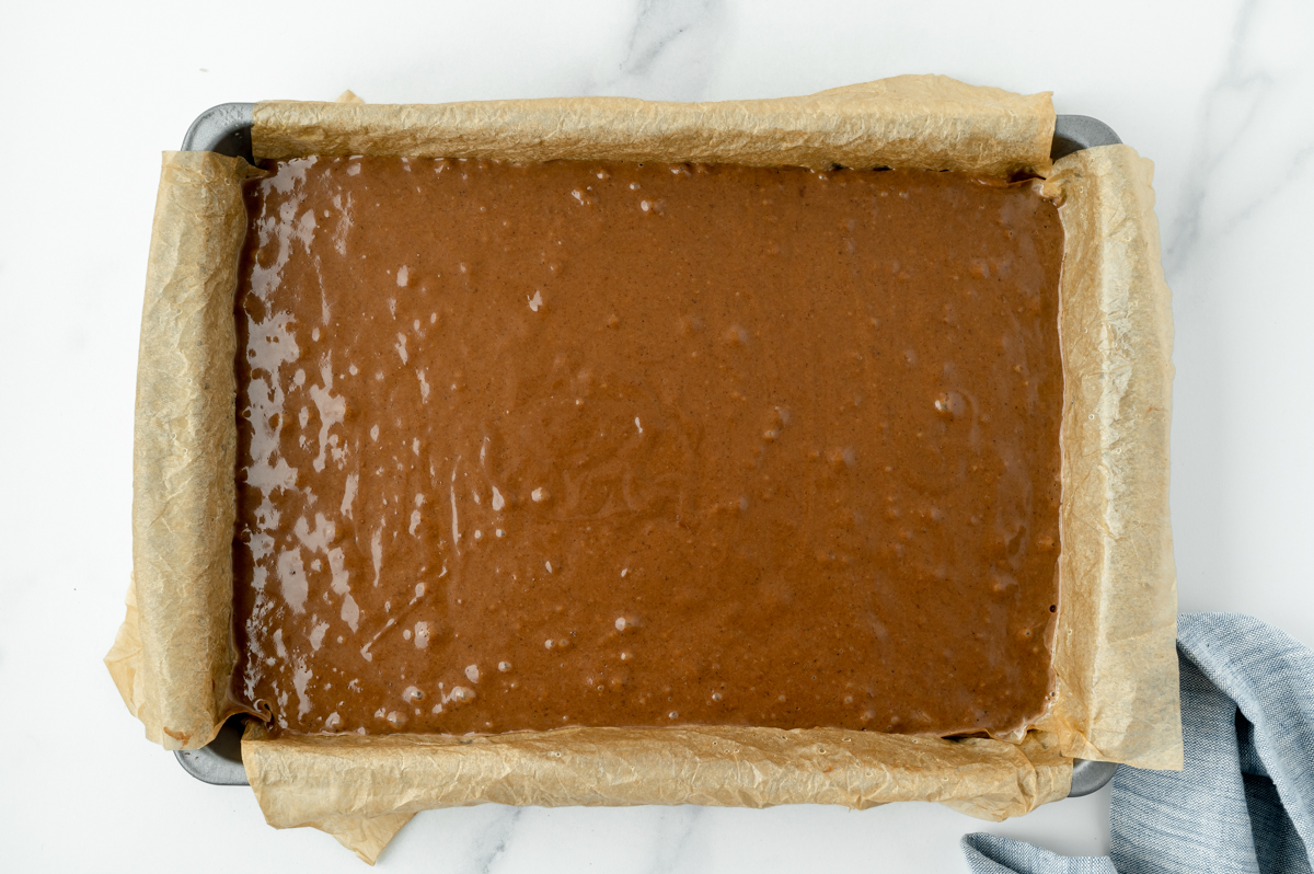 chocolate cake batter in pan