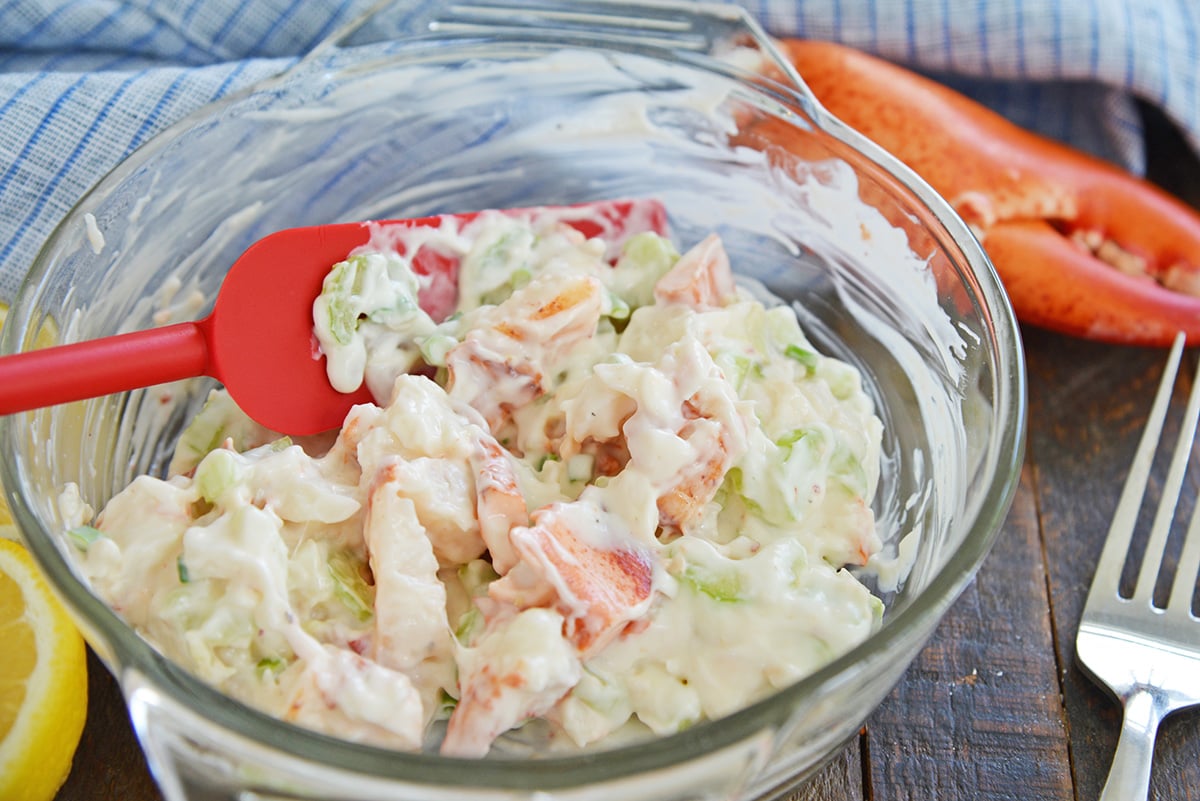lobster salad in a glass mixing bowl