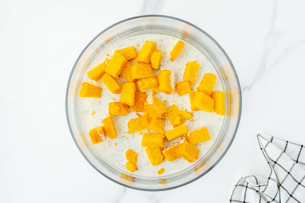 cornbread soaking in dressing