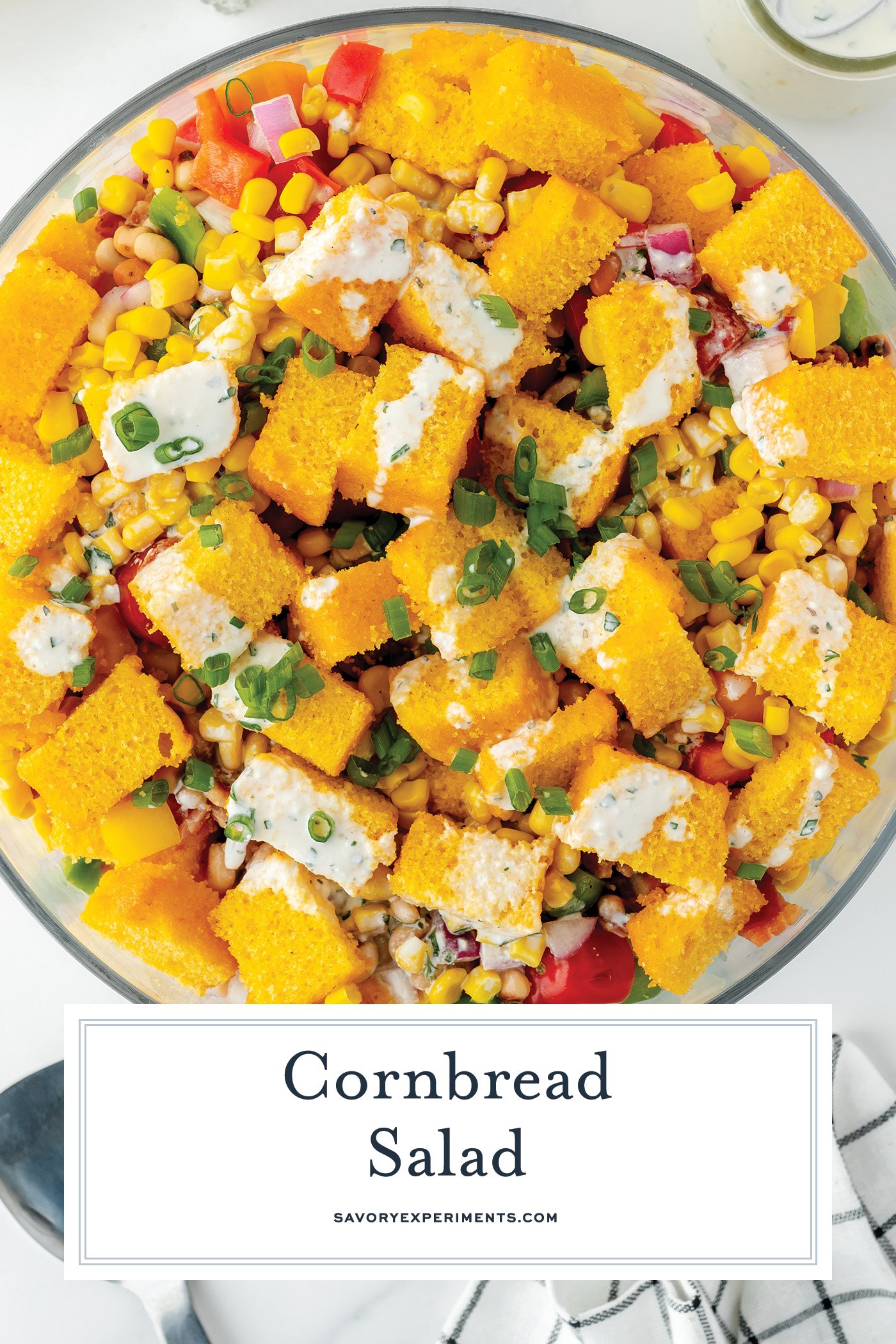 overhead shot of bowl of cornbread salad with text overlay