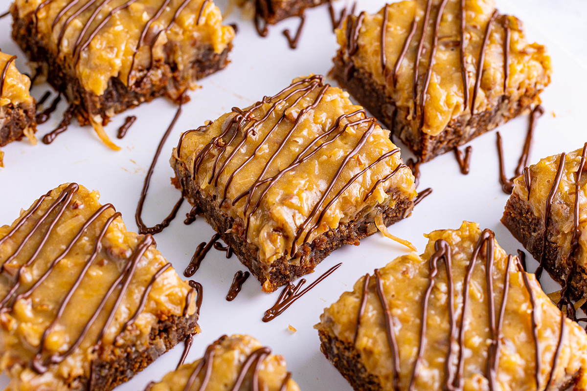 squares of german chocolate brownies with gooey topping