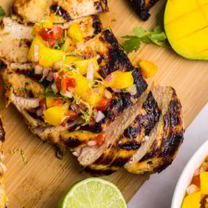 close up overhead shot of sliced grilled mango chicken