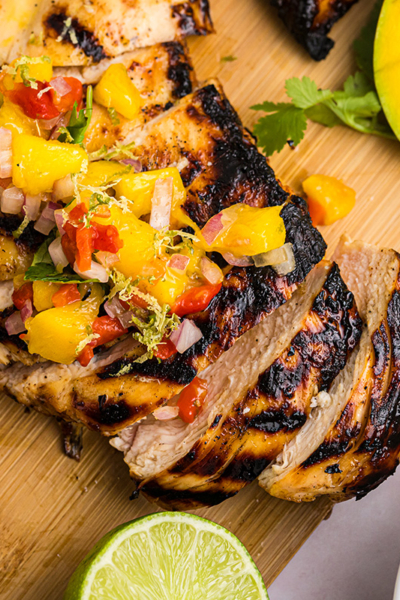 close up overhead shot of sliced grilled mango chicken