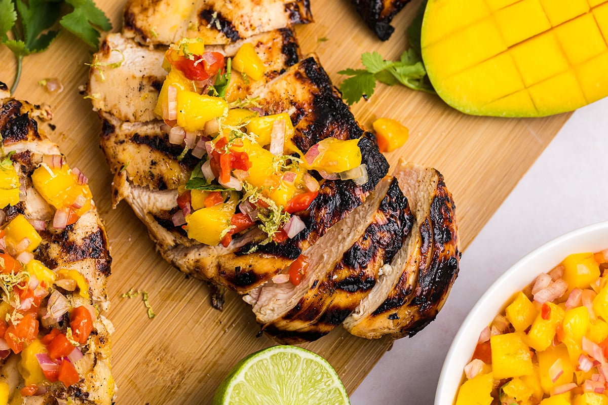 close up overhead shot of sliced grilled mango chicken