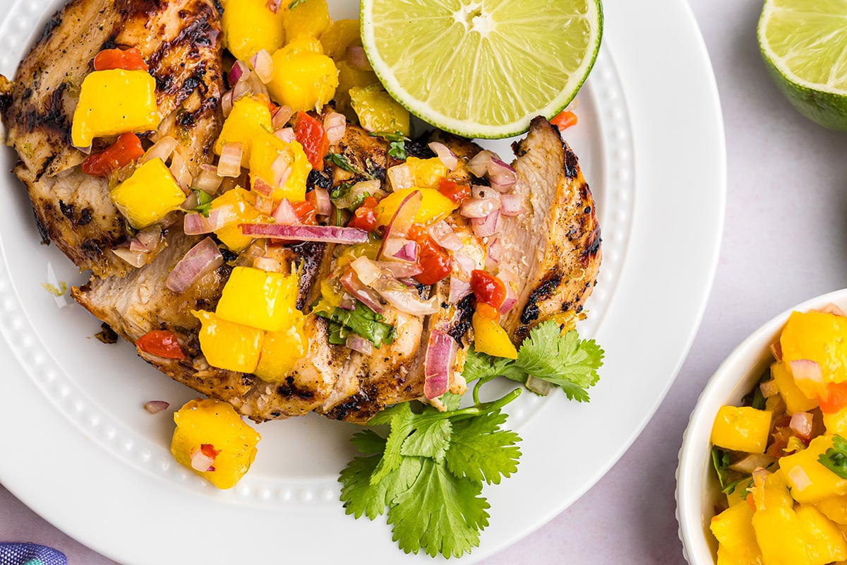 overhead shot of plate of grilled mango chicken