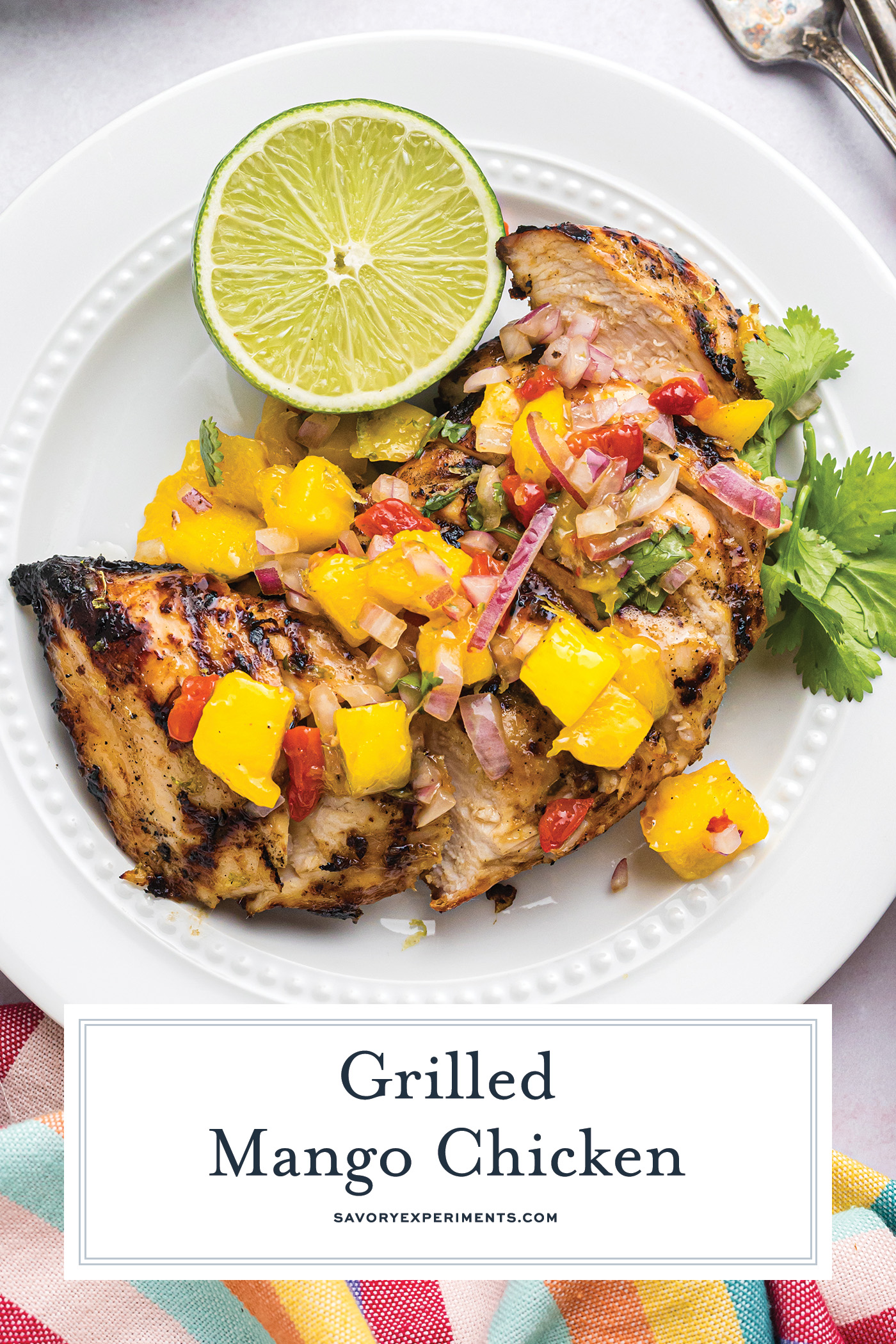 overhead shot of plate of grilled mango chicken with text overlay
