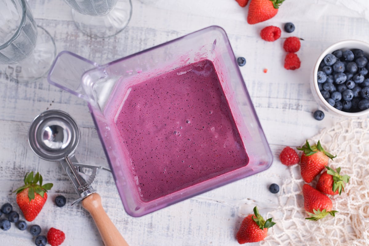 overhead shot of grimace shake in blender