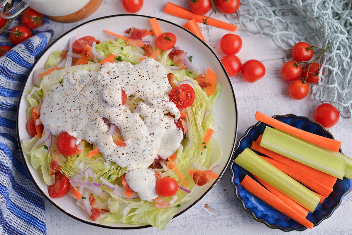 overhead shot of salad topped with dressing