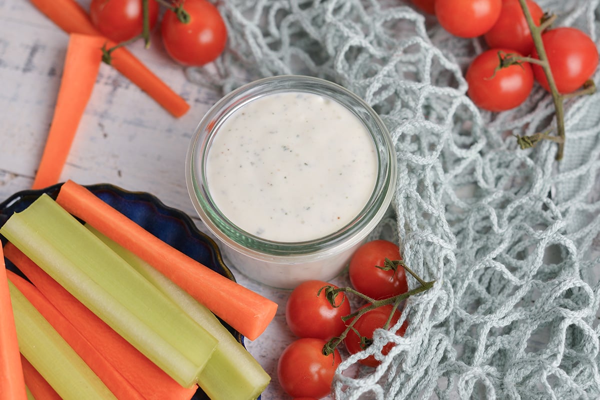 angled shot of jar of light ranch sauce