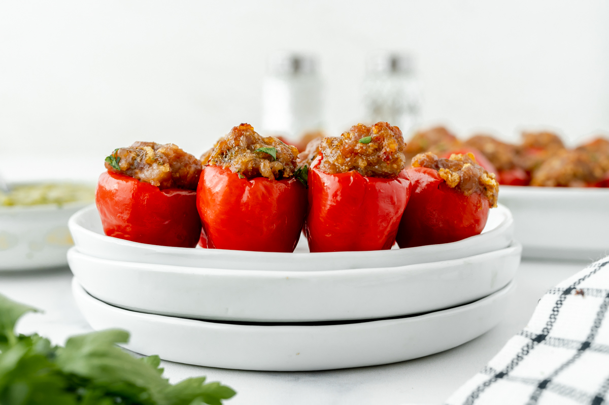 straight on shot of stuffed cherry peppers on plate