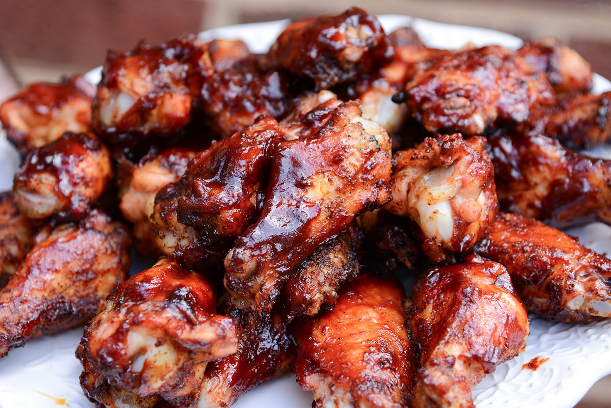 close up of smoked chicken wings with BBQ sauce