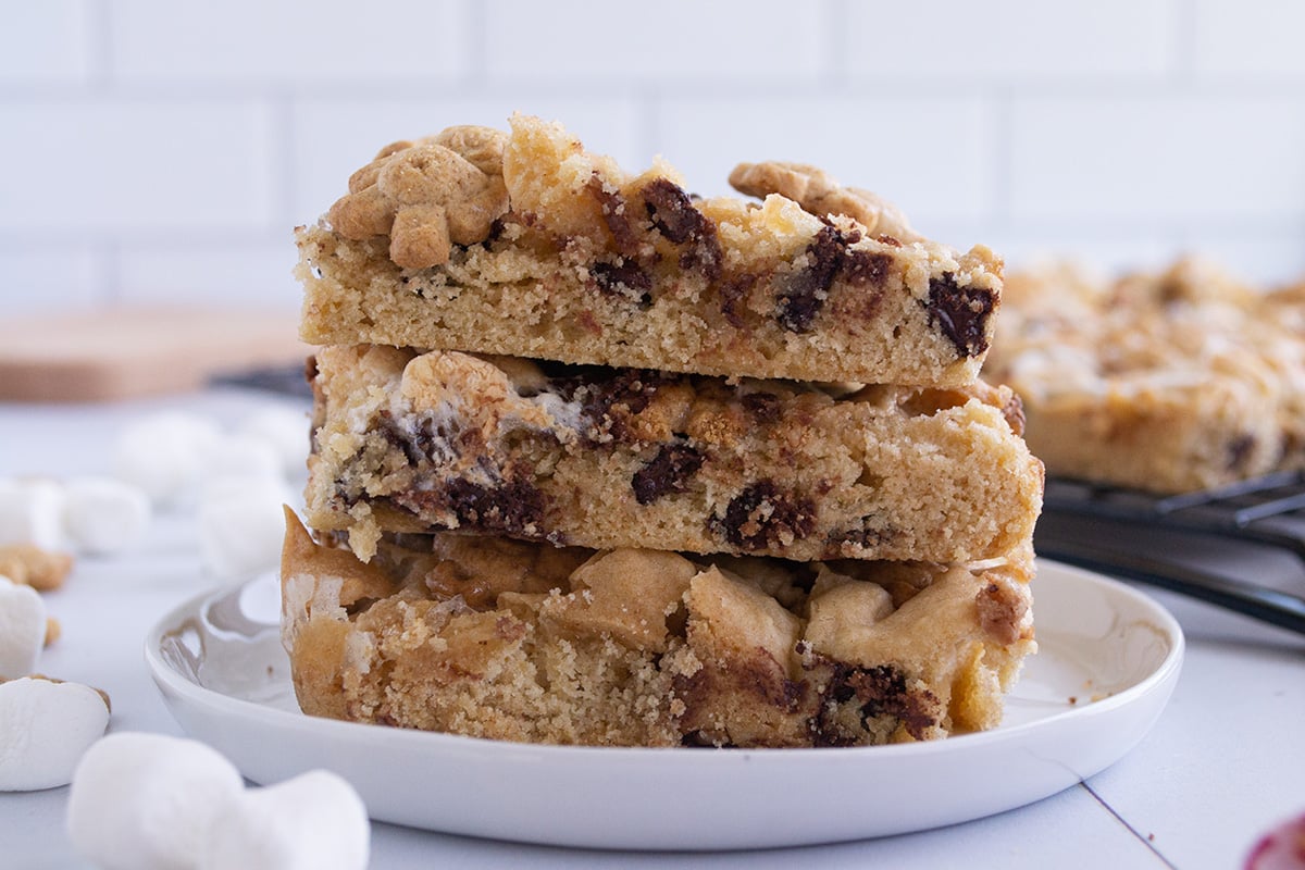 stack of three s'mores cookies in a white plate