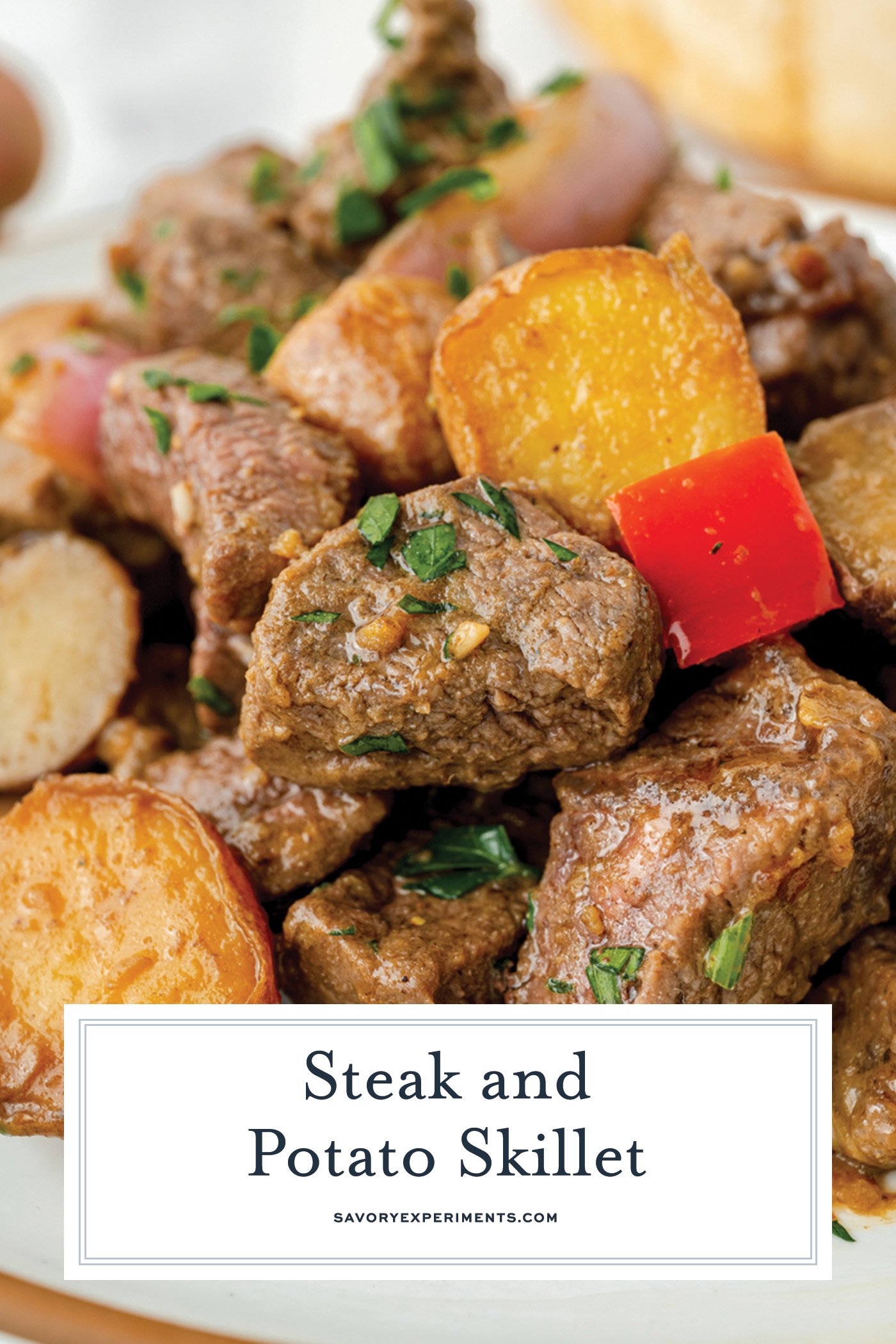 angled shot of steak and potatoes on plate with text overlay