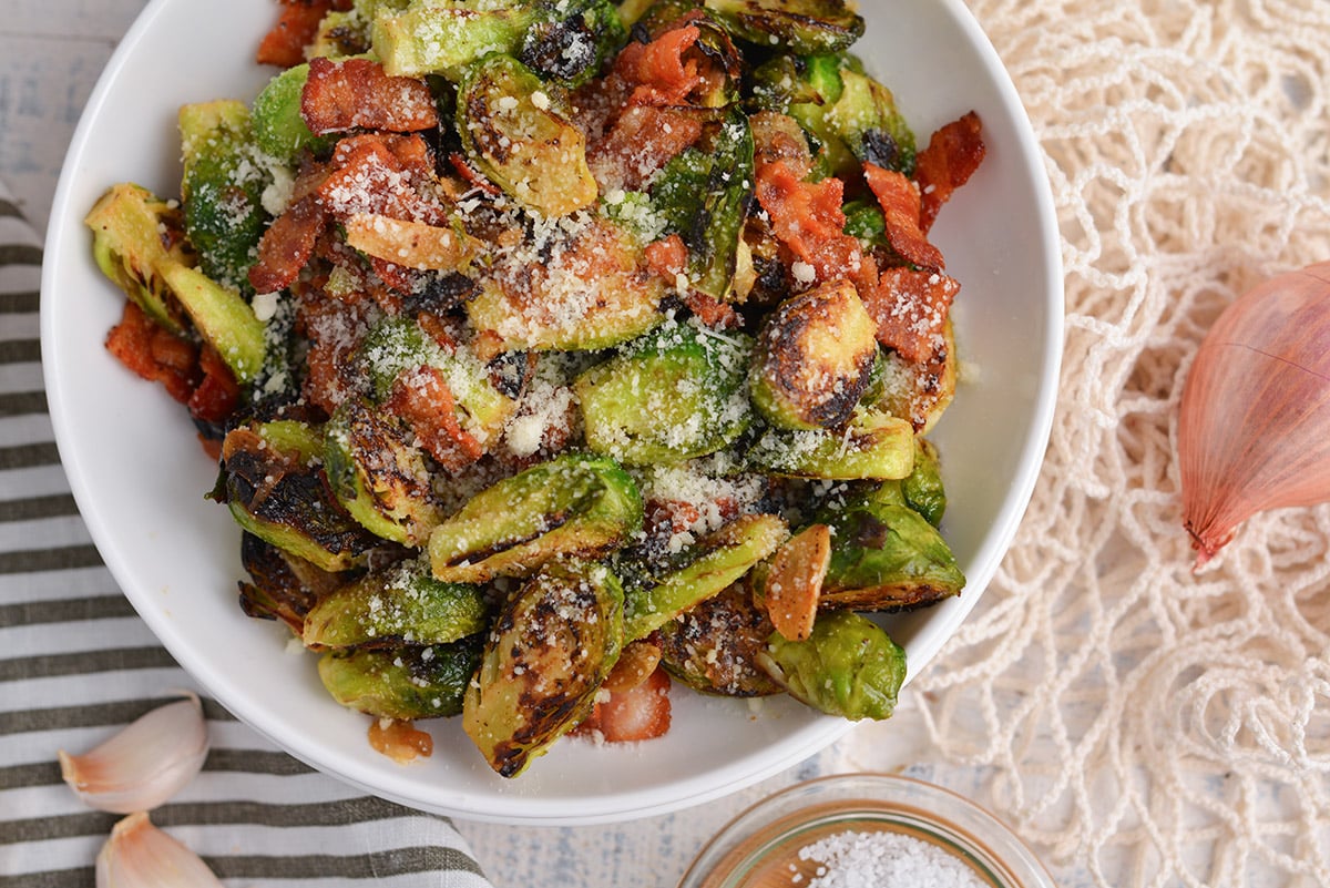overhead shot of bowl of brussels sprouts with bacon