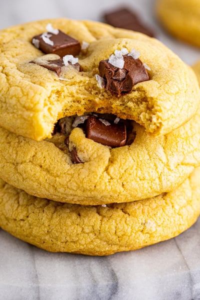 bite taken out of a cookie with chocolate