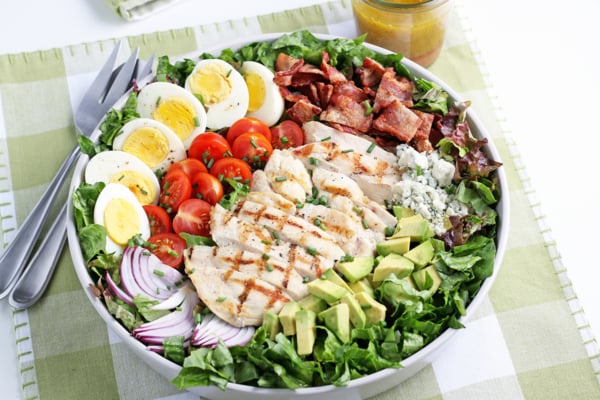 cobb salad on a green placemat