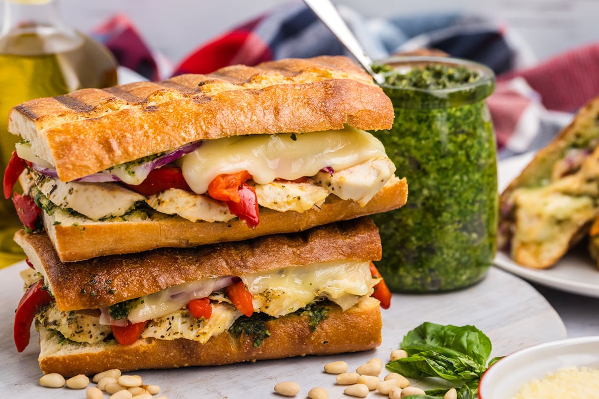 stack of italian chicken paninis with pesto