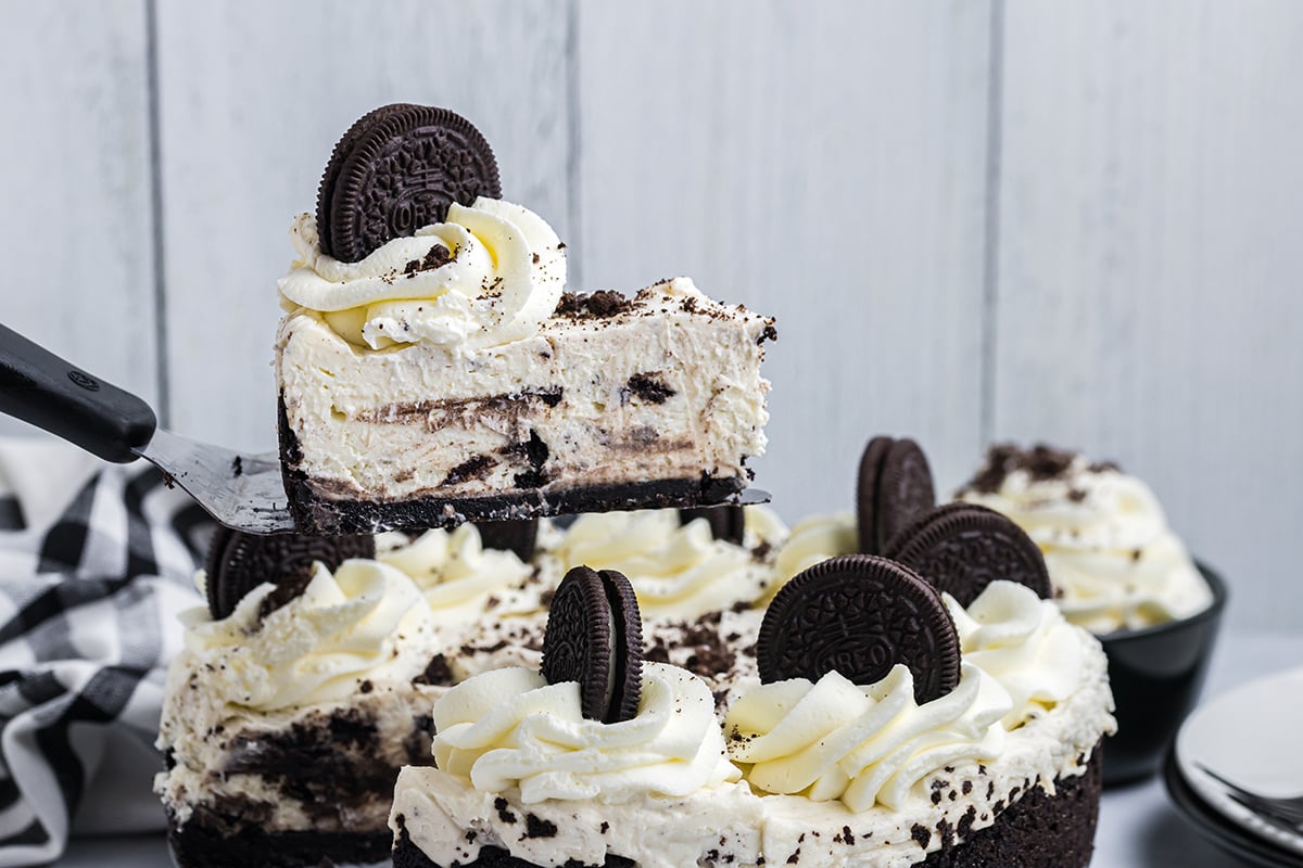 straight on shot of slice of oreo cheesecake on spatula