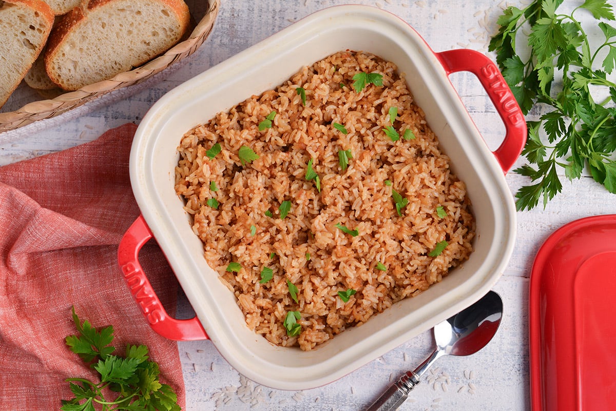 overhead shot of stick of butter rice recipe in dish