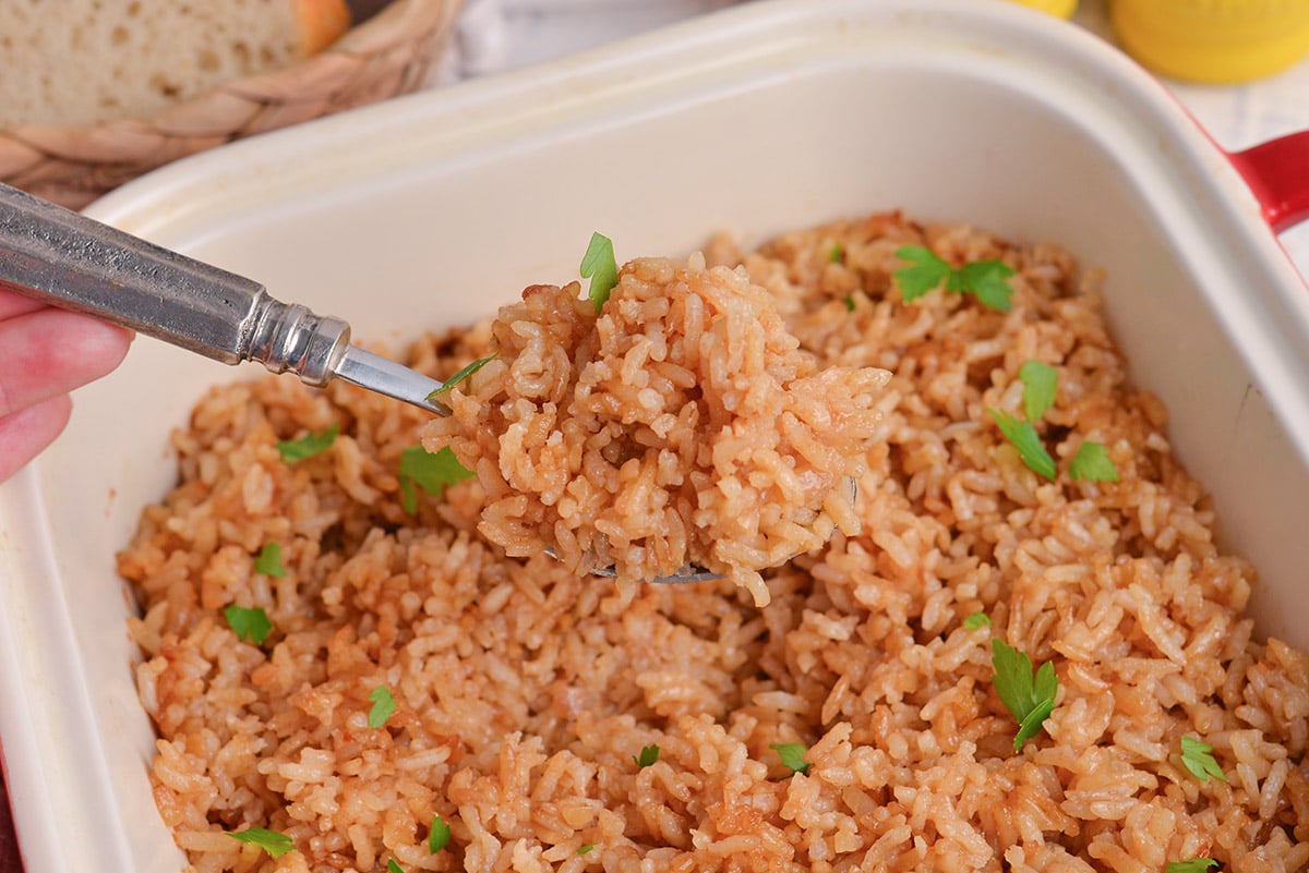 close up of spoon of butter stick rice