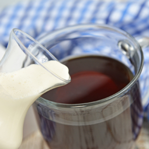 Homemade creamer pouring into coffee
