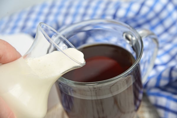 Homemade creamer pouring into coffee