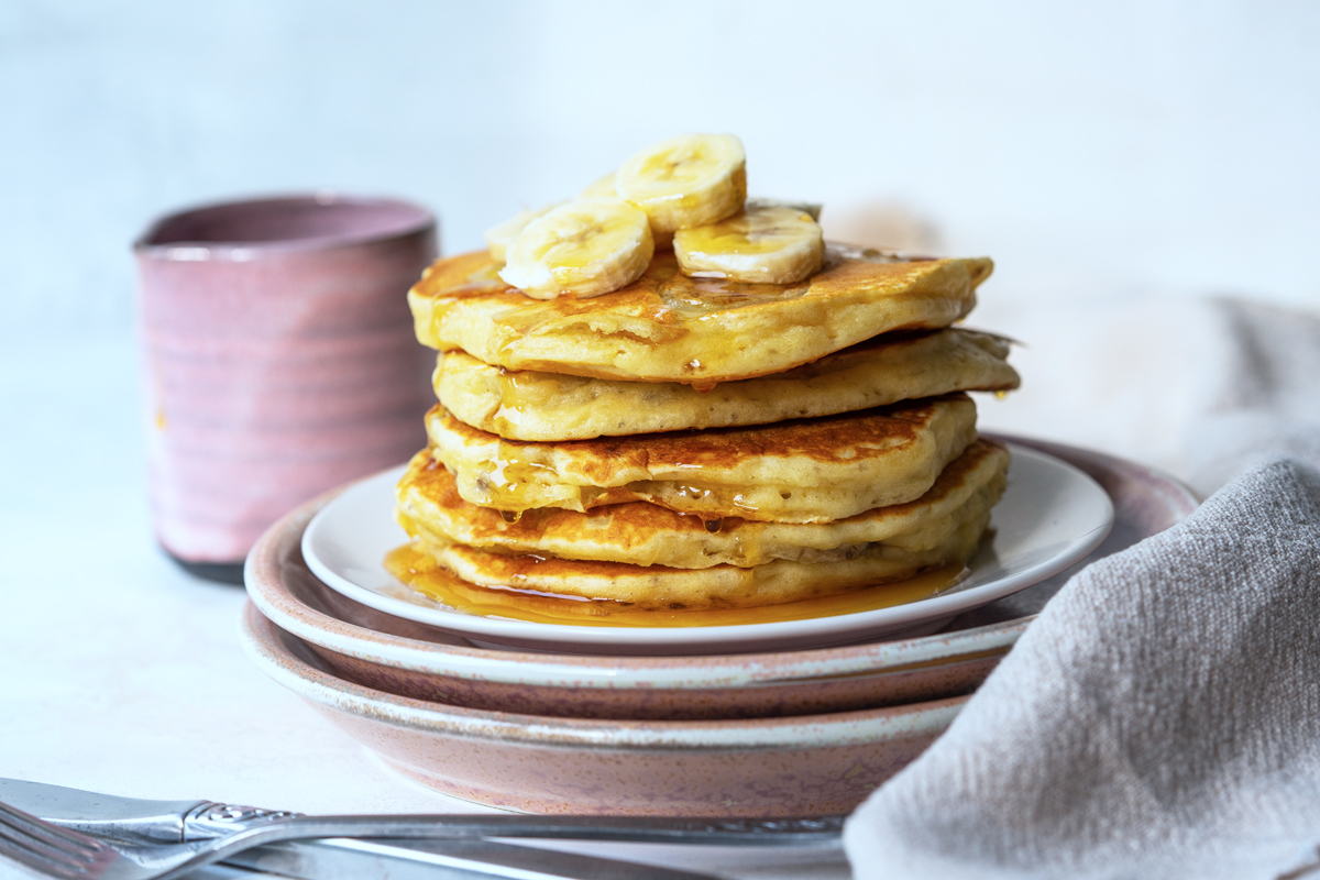 straight on shot of stack of banana pancakes