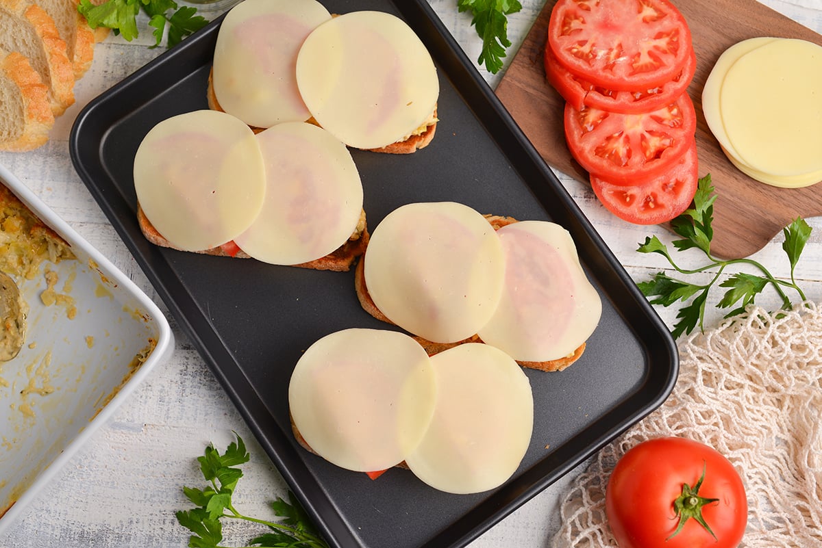 cheese slices on sandwich halves