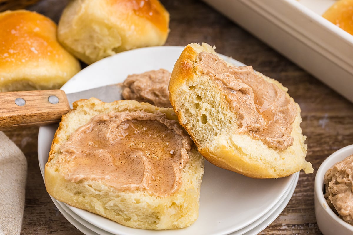 angled shot of cinnamon butter on dinner roll