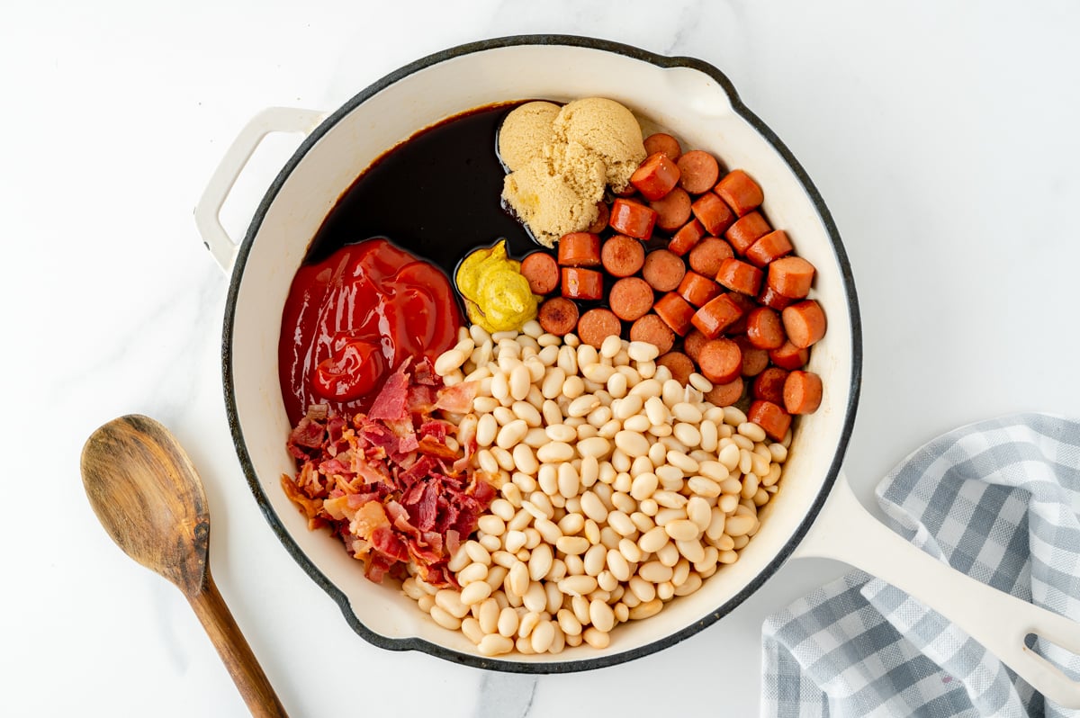 franks and beans ingredients in pan