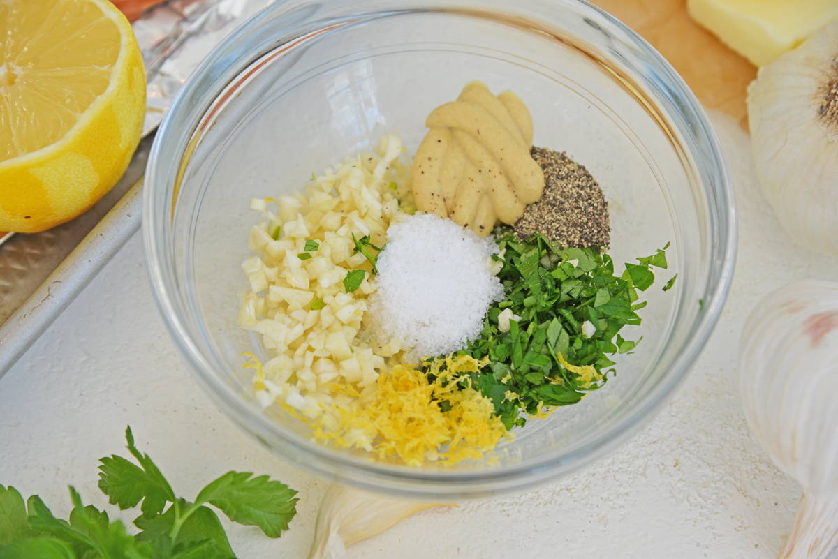 angled shot of garlic butter for salmon ingredients in bowl