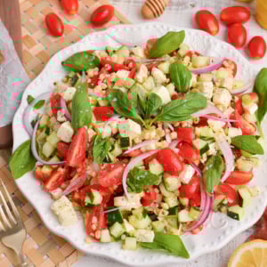 angled shot of grilled corn salad on plate