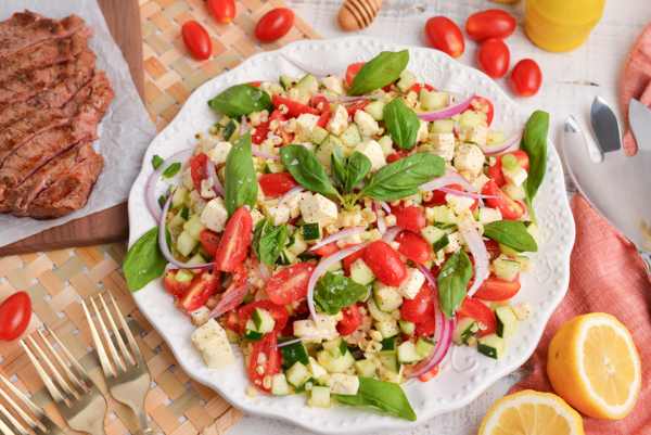 angled shot of grilled corn salad on plate