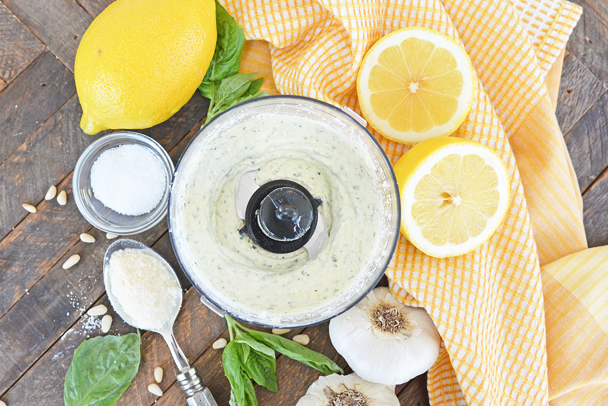 overhead shot of pesto aioli in food processor