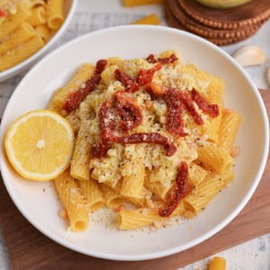 close up shot of bowl of lemon pesto pasta
