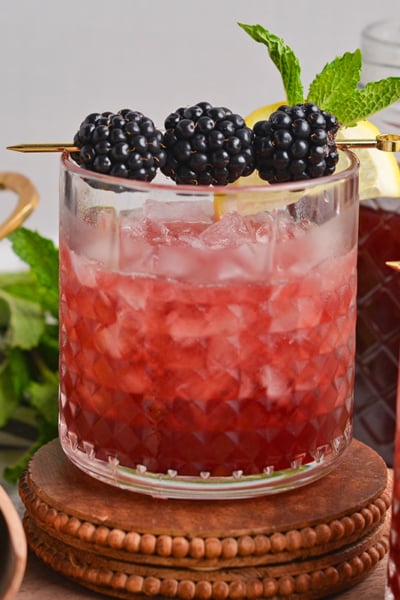 straight on shot of blackberry bourbon smash