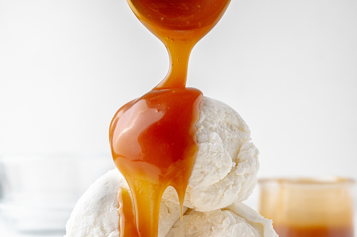 caramel poured onto ice cream
