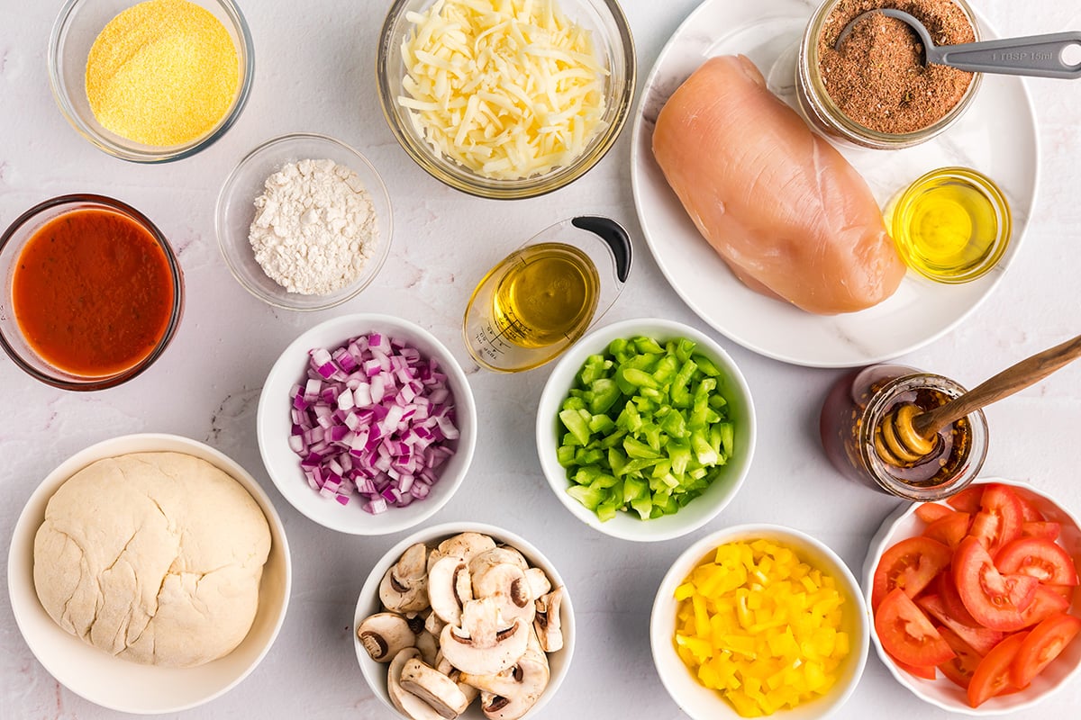 overhead shot of jerk chicken pizza ingredients