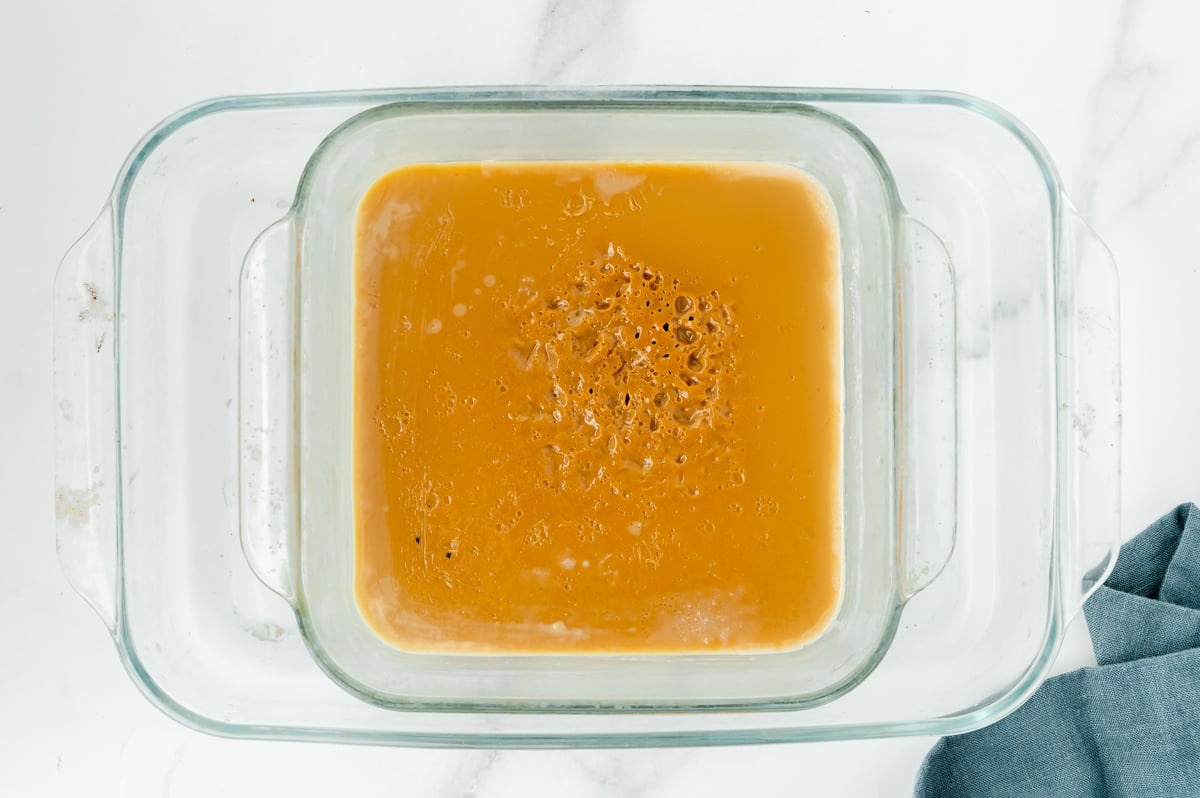overhead shot of pan of sweetened condensed milk caramel