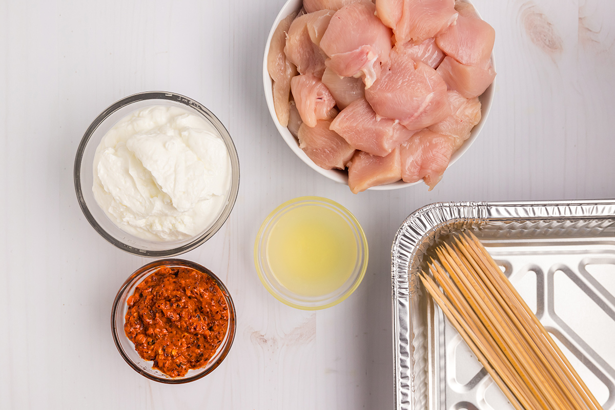 overhead shot of harissa chicken kabobs ingredients