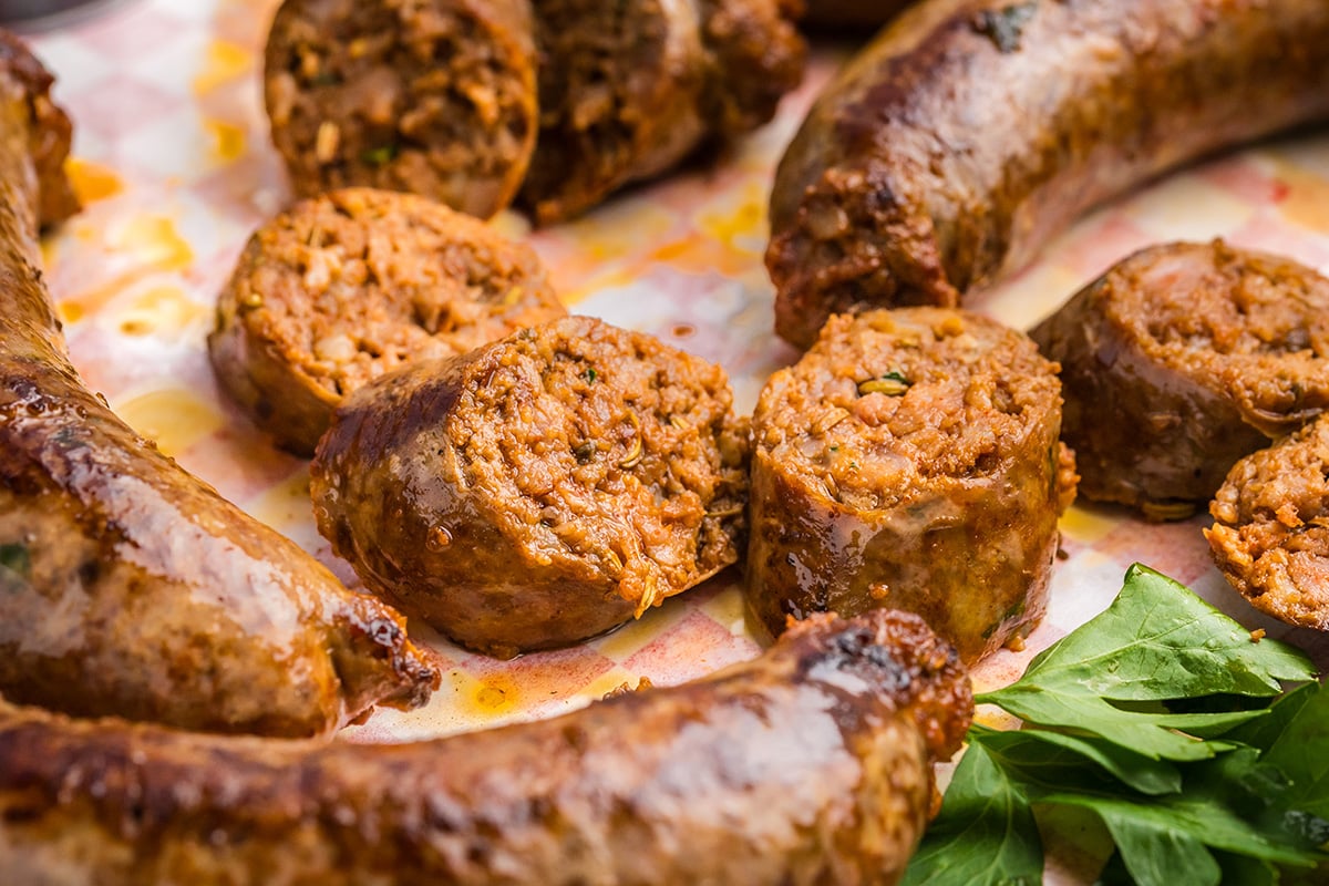 close up angled shot of sliced homemade italian sausage