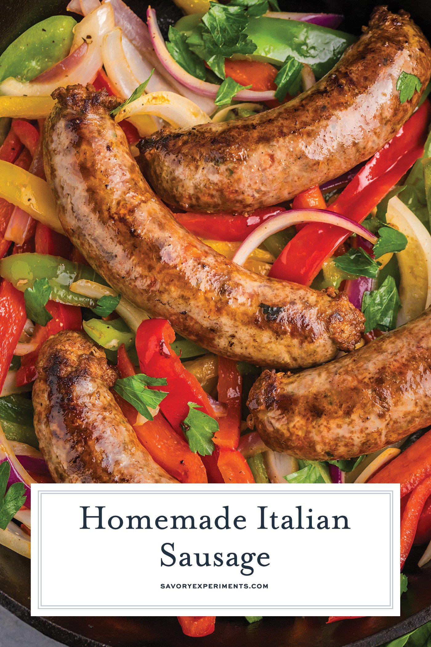 overhead shot of homemade italian sausage in pan with peppers and onions with text overlay