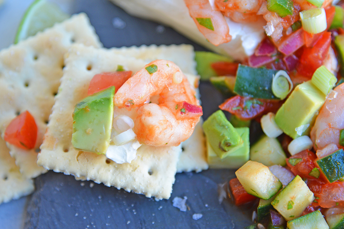 Mexican shrimp cocktail on a saltine cracker